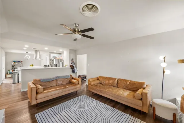 a living room with furniture and a table
