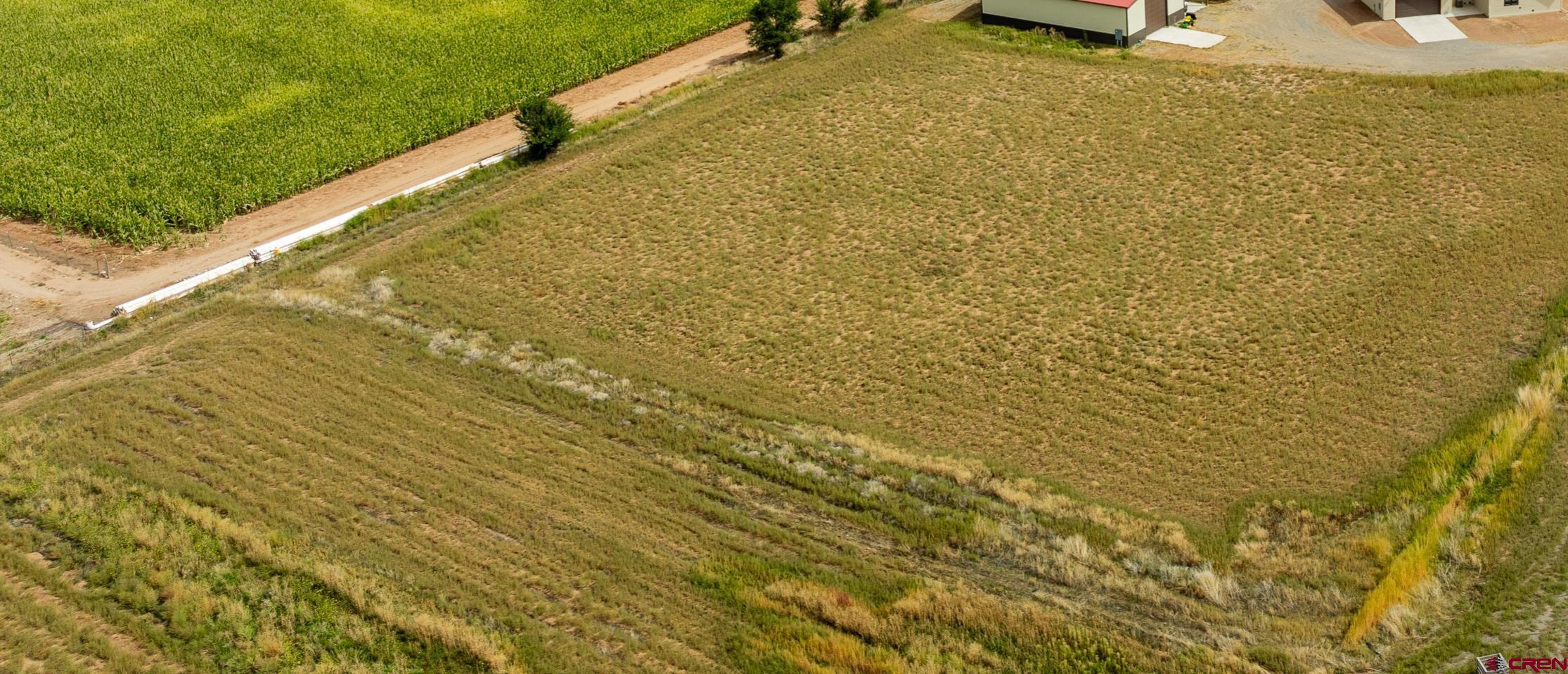 Tbd 6353rd Road Montrose, CO 81403 - Photo 3 of 4 a view of a swimming pool and an outdoor space