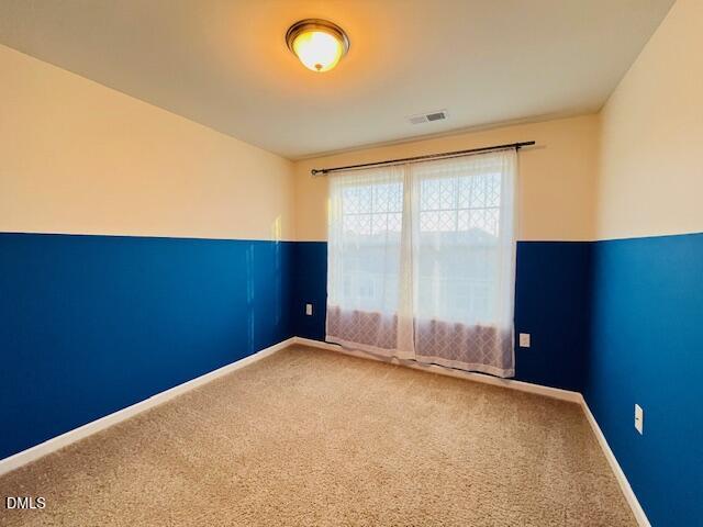 1423 Compass Drive Durham, NC 27713 - Photo 13 of 19 a view of empty room with wooden floor and fan