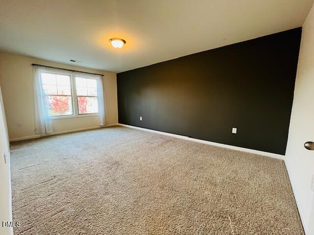 1423 Compass Drive Durham, NC 27713 - Photo 16 of 19 a view of an empty room with a window