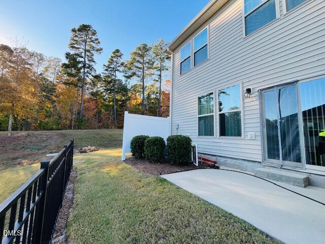 1423 Compass Drive Durham, NC 27713 - Photo 3 of 19 a view of a house with backyard and a patio