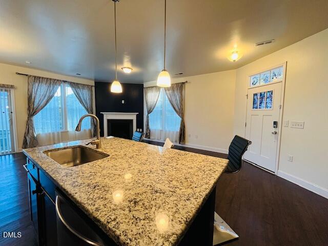 1423 Compass Drive Durham, NC 27713 - Photo 4 of 19 a kitchen with sink and refrigerator