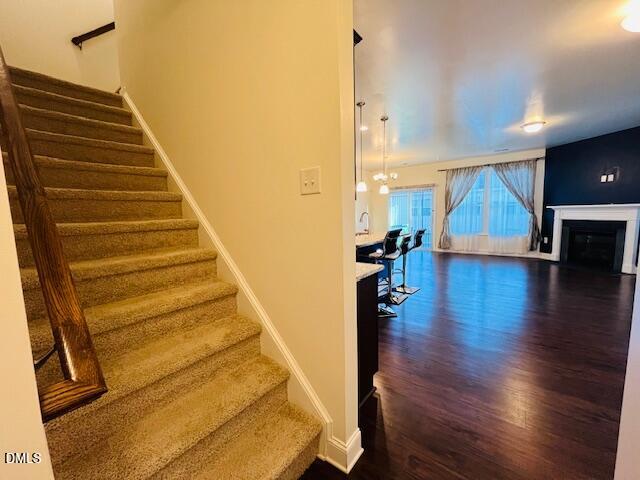 1423 Compass Drive Durham, NC 27713 - Photo 9 of 19 a view of entryway and hall with wooden floor