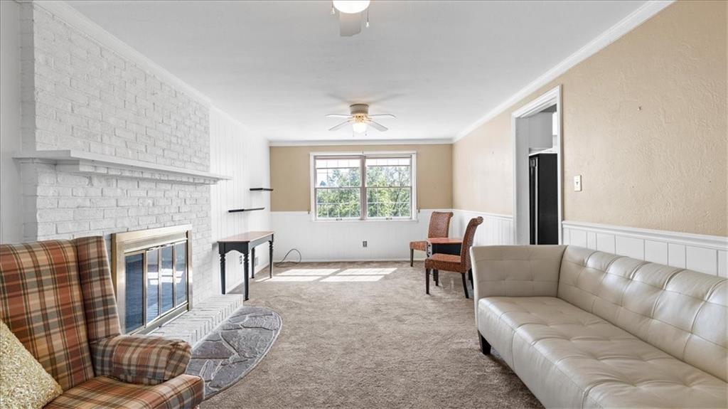 205 Camelford Road McMurray, PA 15317 - Photo 11 of 32 a living room with furniture and a fireplace