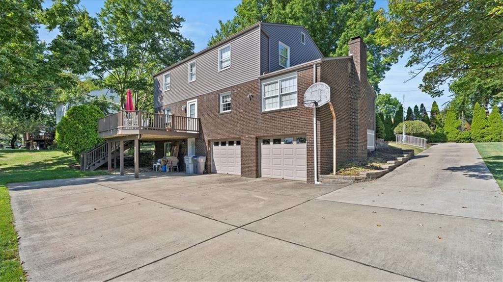205 Camelford Road McMurray, PA 15317 - Photo 27 of 32 a front view of a house with yard and trees
