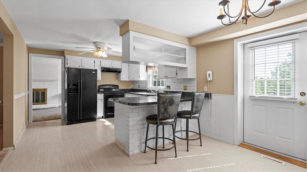 205 Camelford Road McMurray, PA 15317 - Photo 6 of 32 a kitchen with a refrigerator and a sink