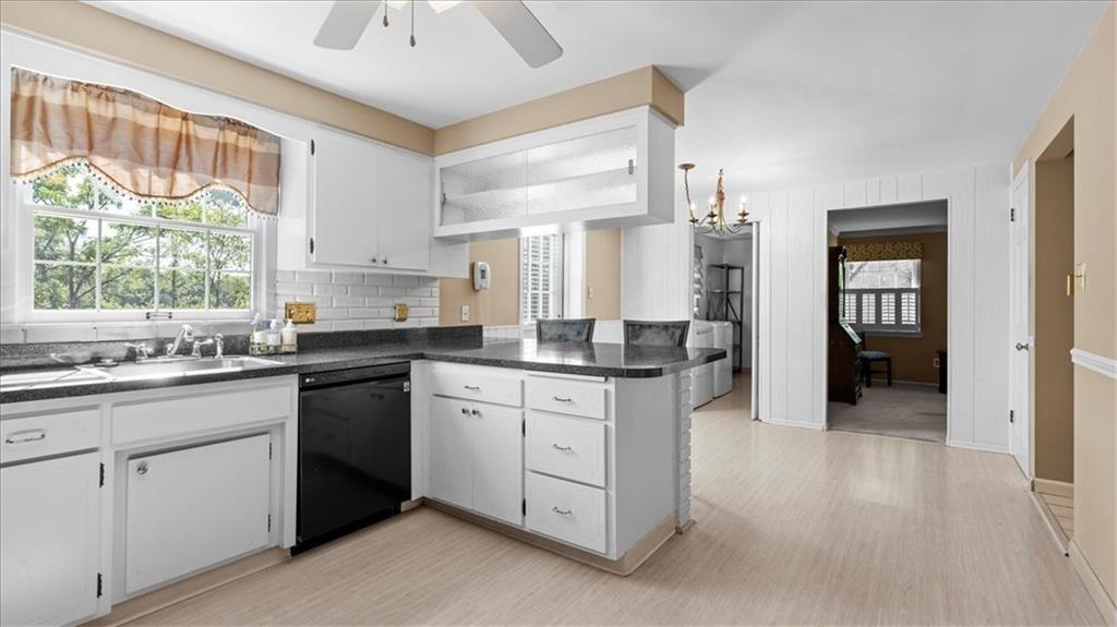 205 Camelford Road McMurray, PA 15317 - Photo 8 of 32 a kitchen with granite countertop white cabinets and white appliances