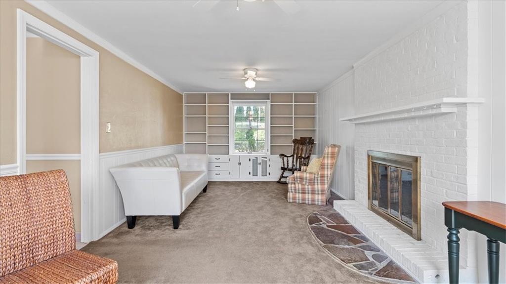 205 Camelford Road McMurray, PA 15317 - Photo 10 of 32 a living room with furniture and a fireplace