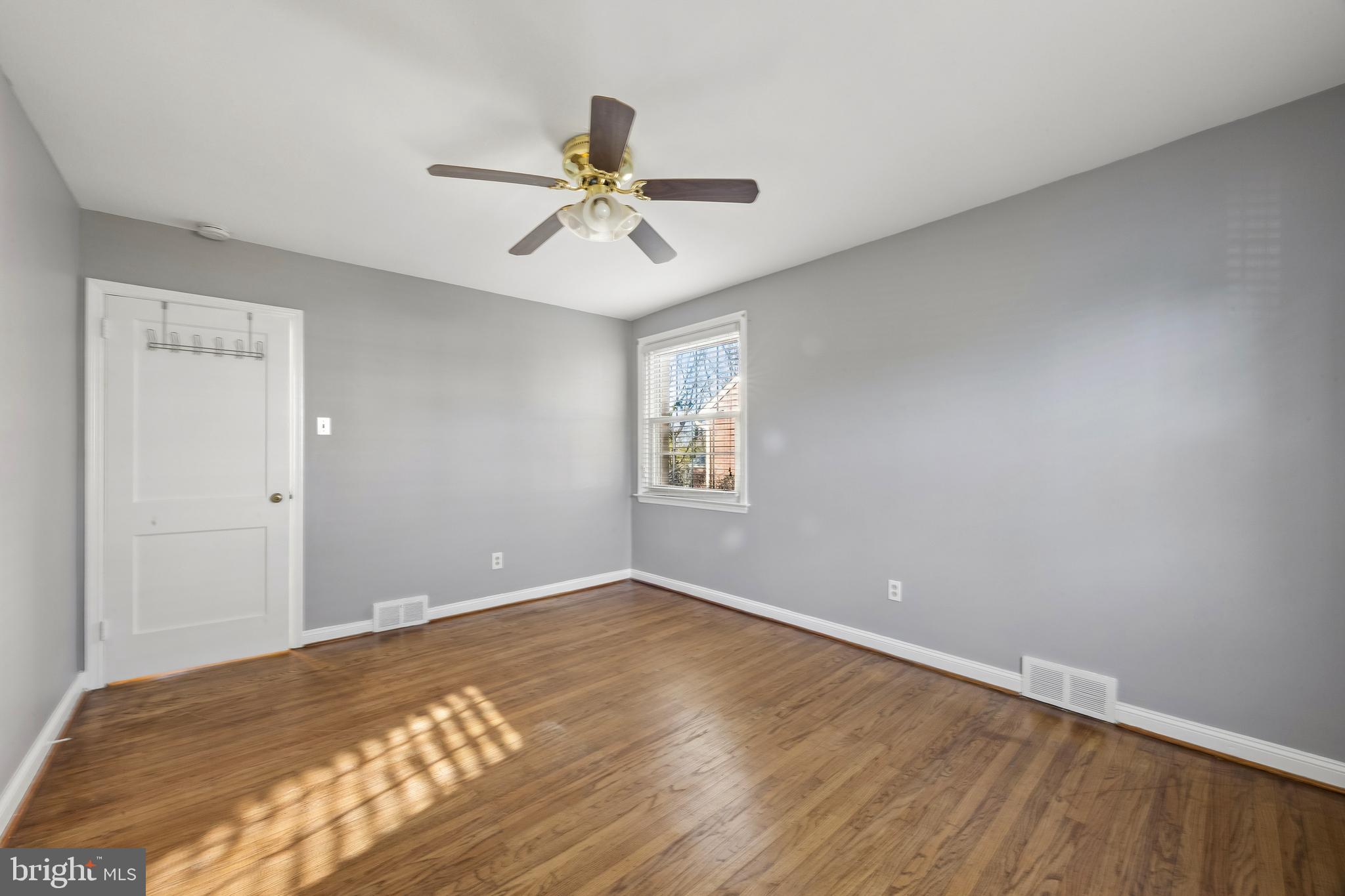336 Valley View Road Springfield, PA 19064 - Photo 14 of 24 a view of a big room with wooden floor and closet area