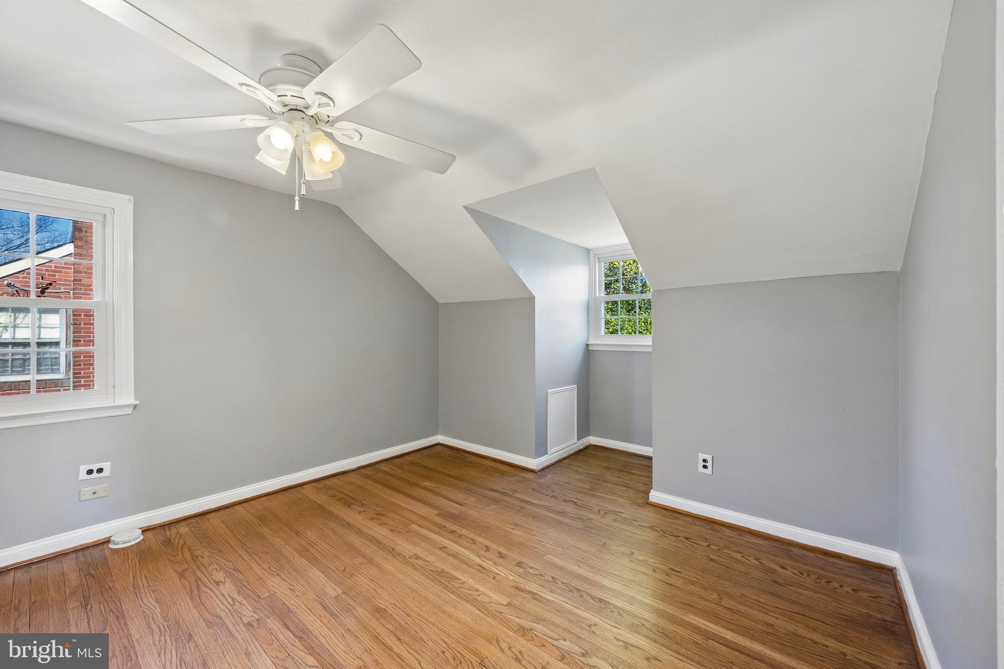 336 Valley View Road Springfield, PA 19064 - Photo 16 of 24 wooden floor in an empty room with a window