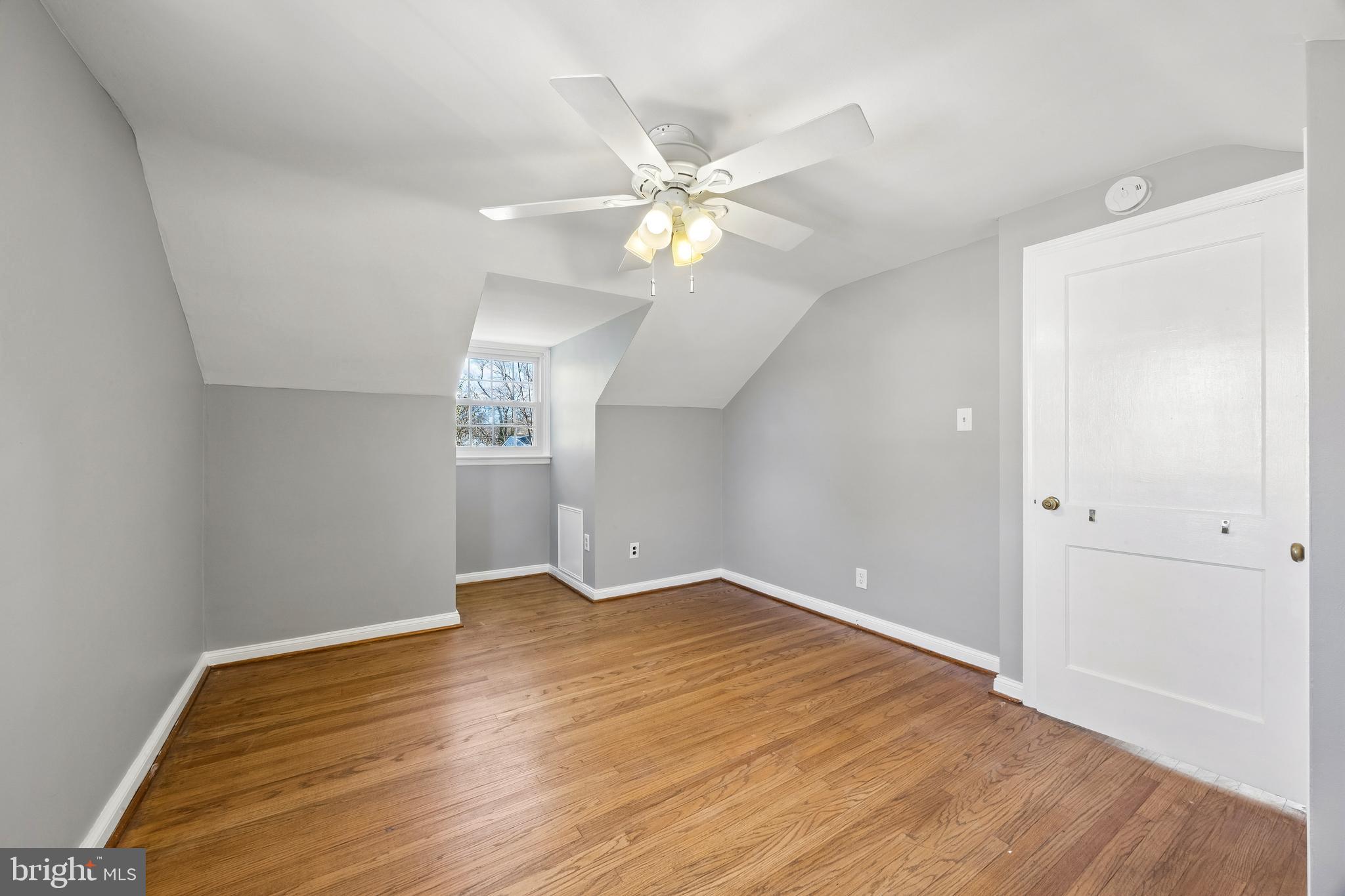 336 Valley View Road Springfield, PA 19064 - Photo 17 of 24 wooden floor in an empty room with a window