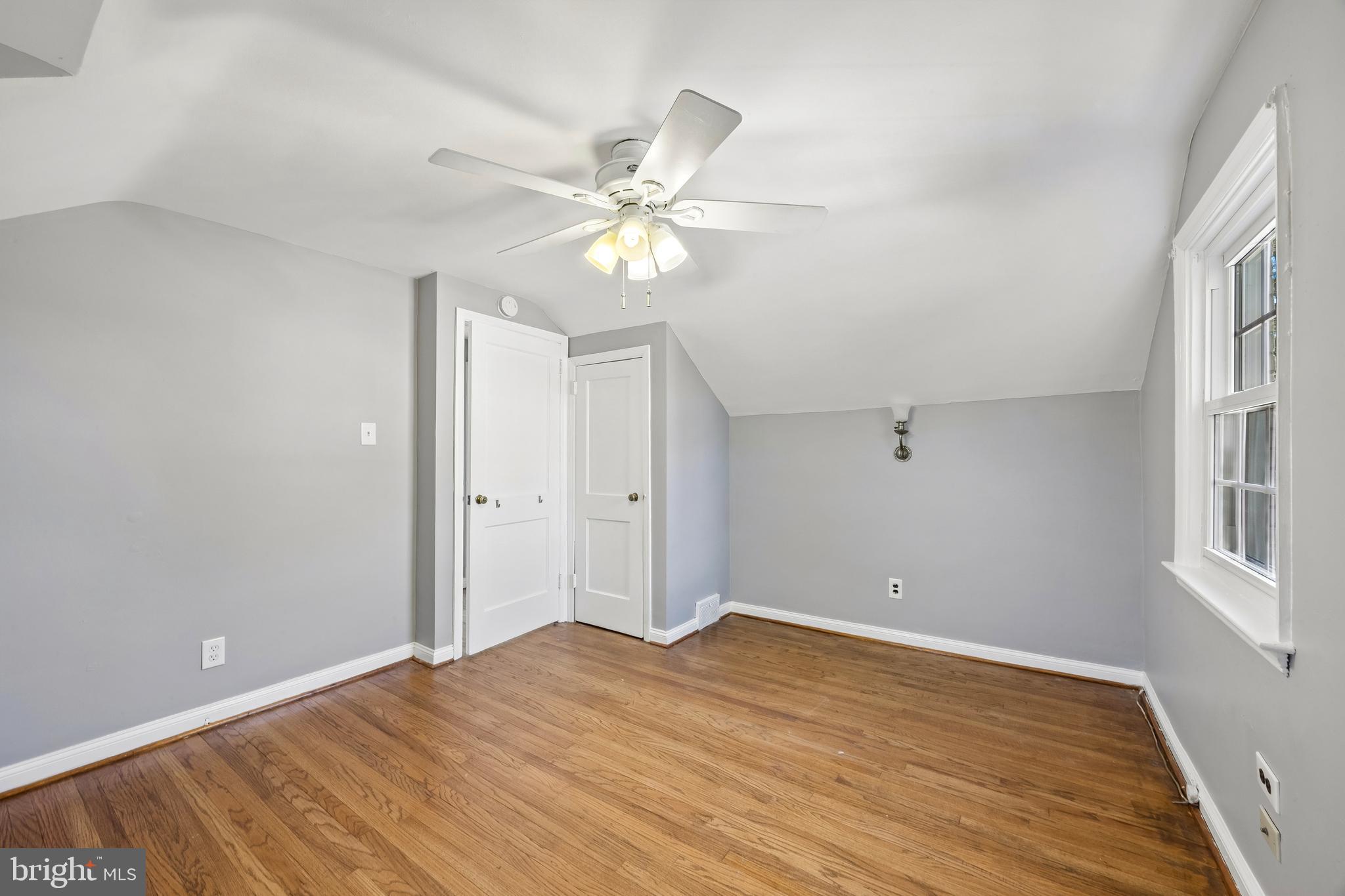 336 Valley View Road Springfield, PA 19064 - Photo 18 of 24 wooden floor in an empty room with a window