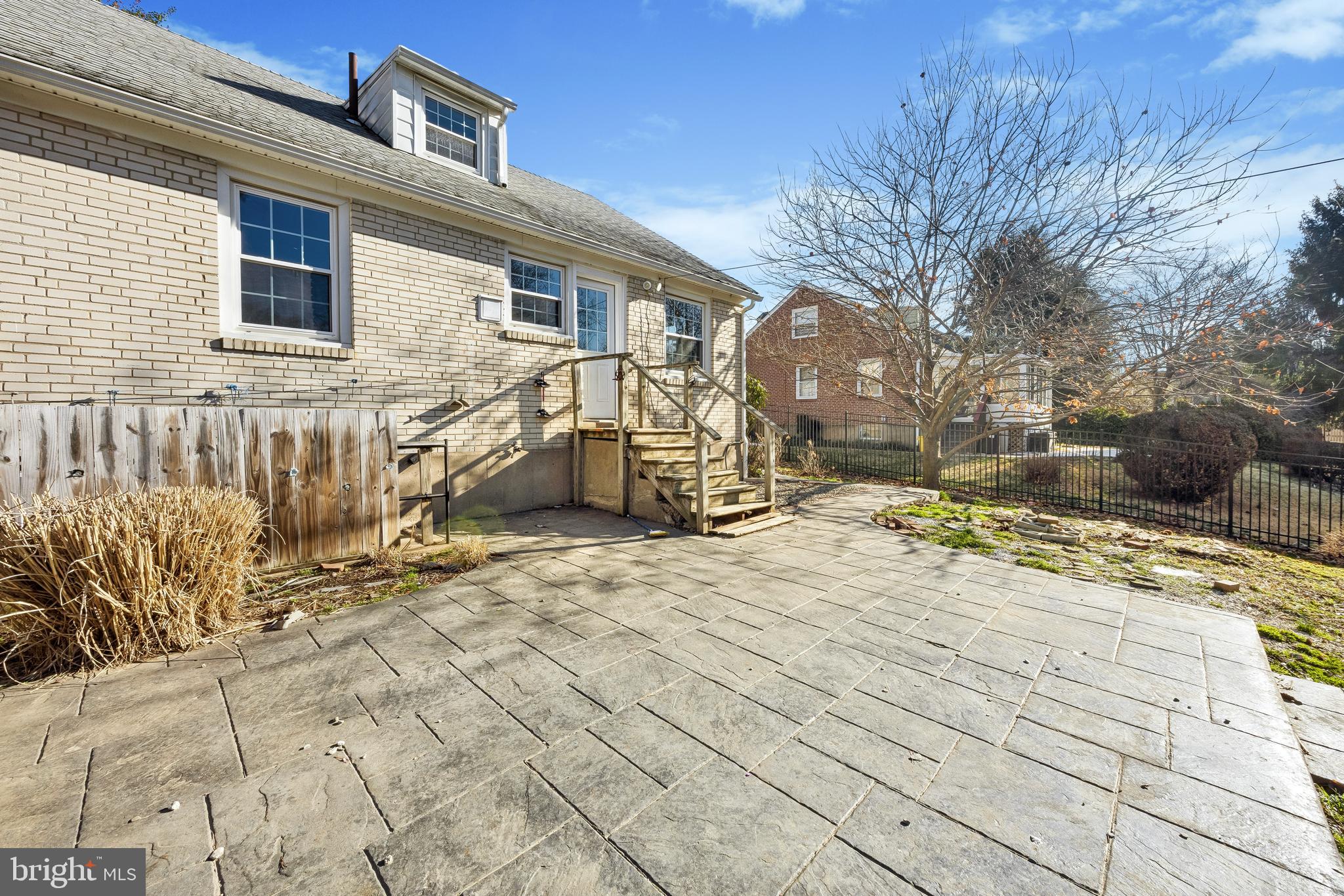 336 Valley View Road Springfield, PA 19064 - Photo 23 of 24 a street view with wooden fence