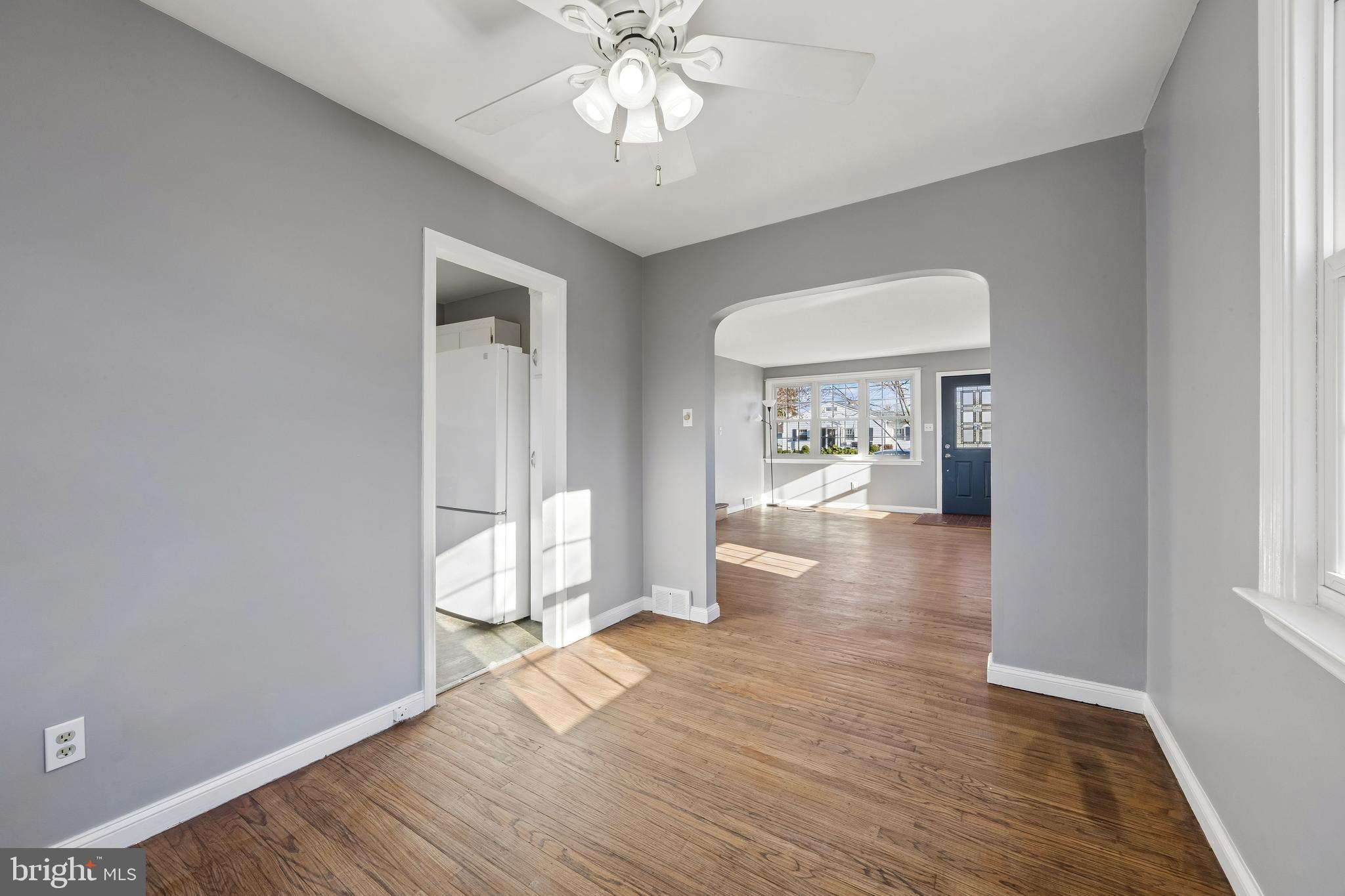 336 Valley View Road Springfield, PA 19064 - Photo 7 of 24 wooden floor in an empty room with a window