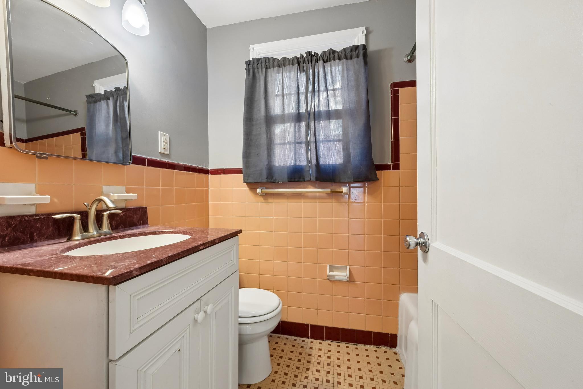336 Valley View Road Springfield, PA 19064 - Photo 10 of 24 a bathroom with a sink a toilet and shower