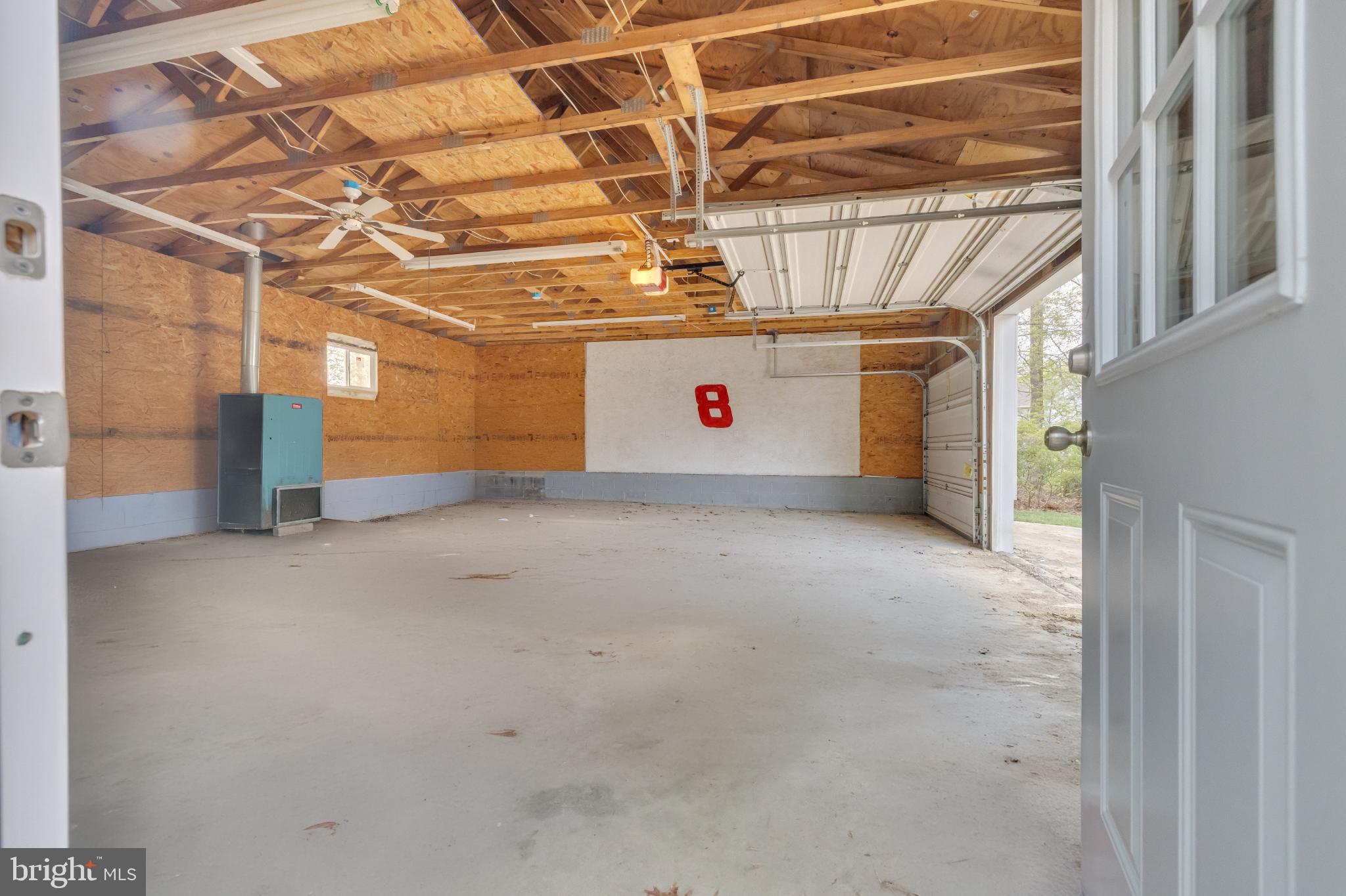 413 Trimble Road Joppa, MD 21085 - Photo 46 of 54 Spacious garage with natural light.