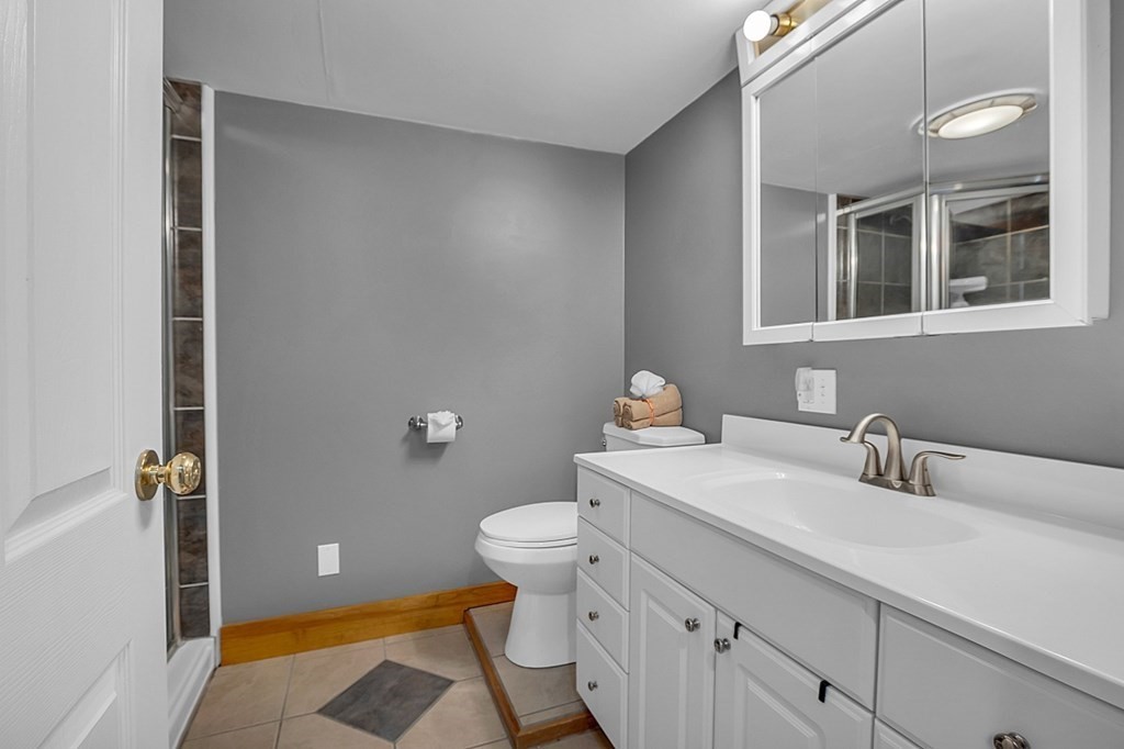 21 River Road Templeton, MA 01436 - Photo 19 of 26 a bathroom with a sink and a toilet