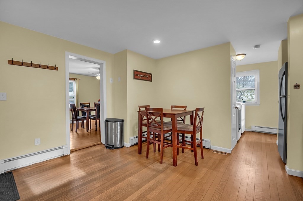 21 River Road Templeton, MA 01436 - Photo 6 of 26 a view of a dining room with furniture and wooden floor