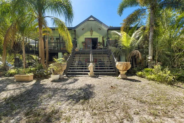 a view of a balcony with wooden floor