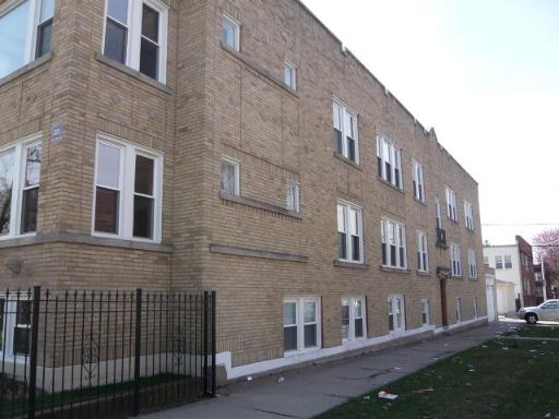 a brick building with a large windows