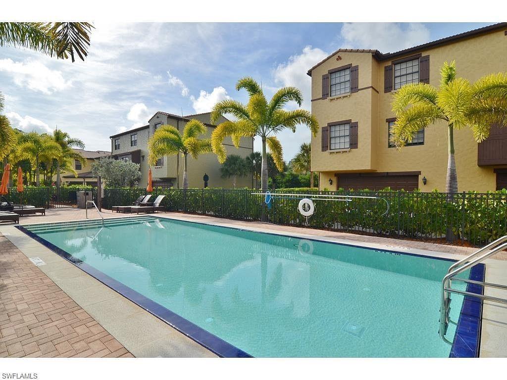 8997 Cambria Circle, Unit 2002 Naples, FL 34113 - Photo 2 of 35 a view of swimming pool