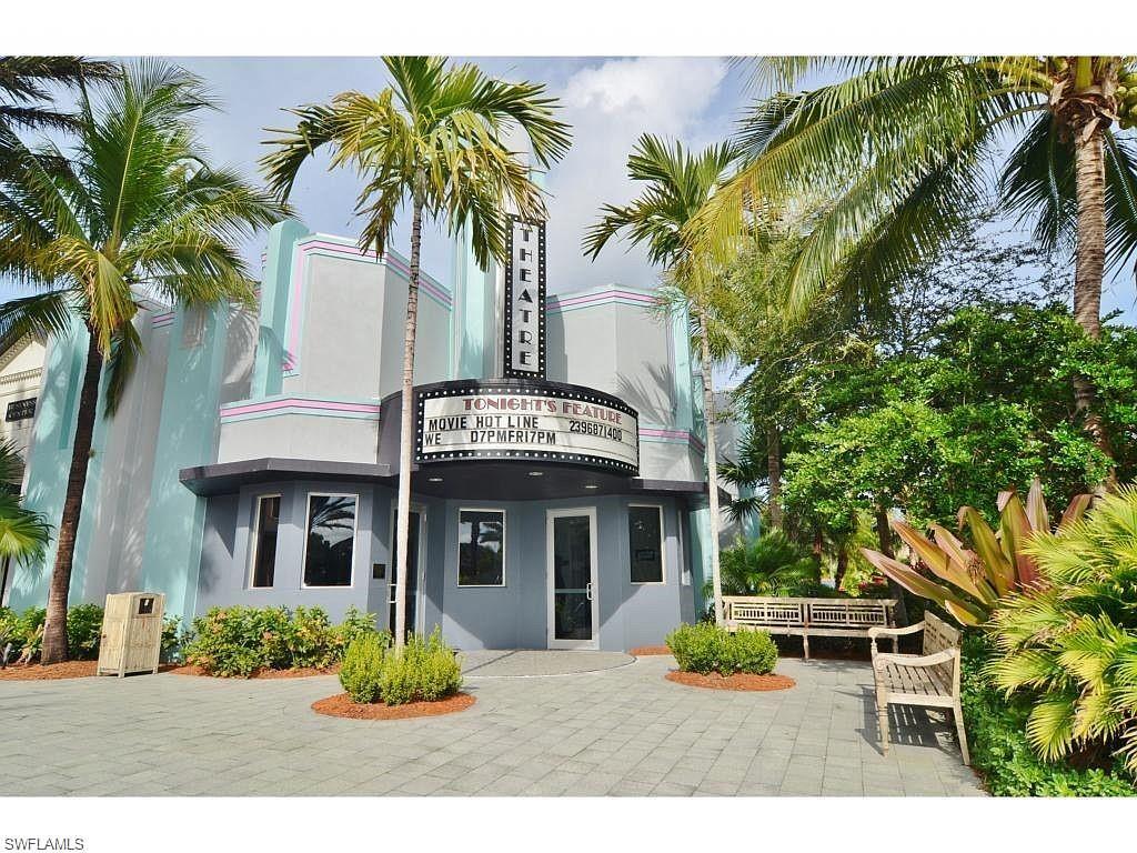 8997 Cambria Circle, Unit 2002 Naples, FL 34113 - Photo 10 of 35 a front view of a house with garden