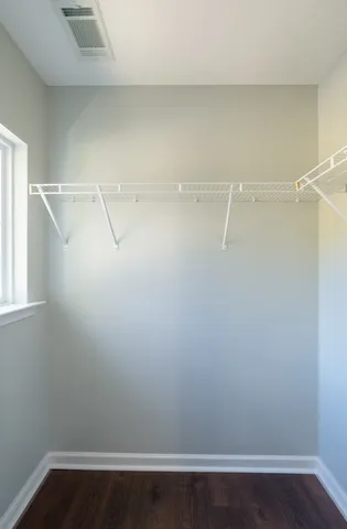 a view of a room with racks on the wall