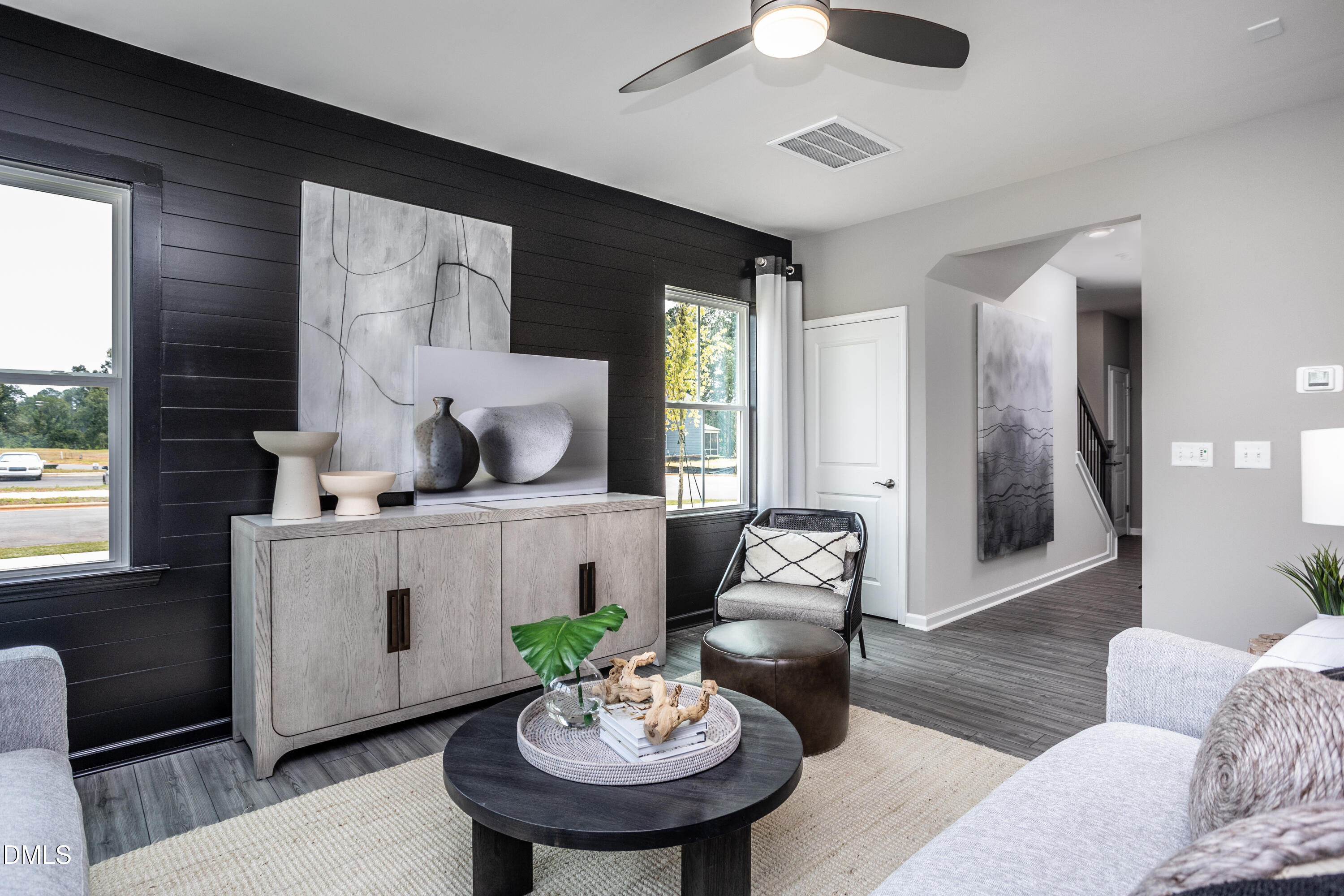2861 Rodeo Court Fuquay-Varina, NC 27526 - Photo 9 of 24 a living room with furniture and a large window