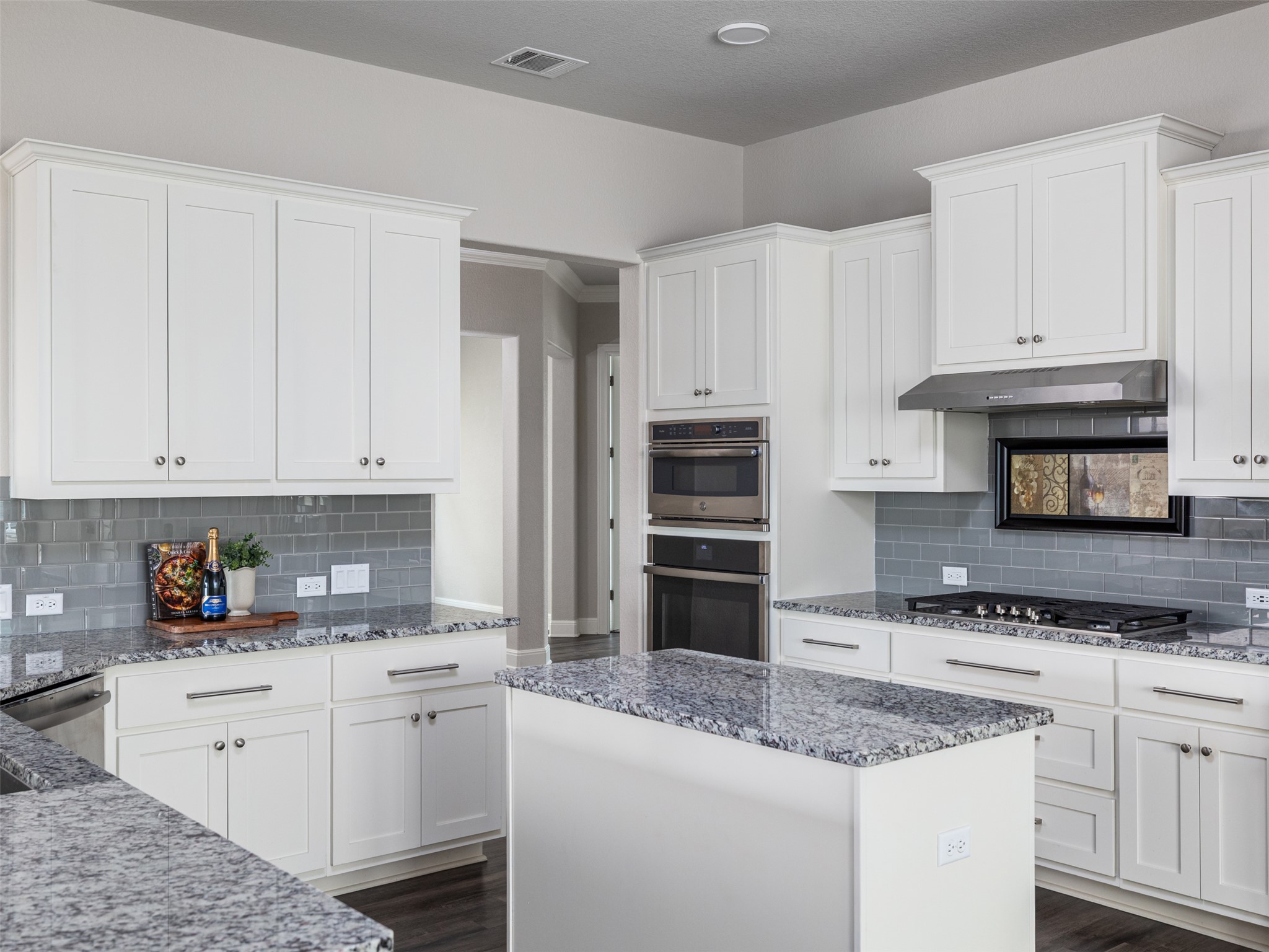 1329 Siena Sunset Road Leander, TX 78641 - Photo 15 of 40 Kitchen also boasts gorgeous granite countertops and modern backsplash
