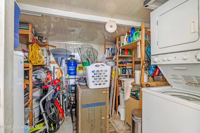 a aerial view of a house with a lake view