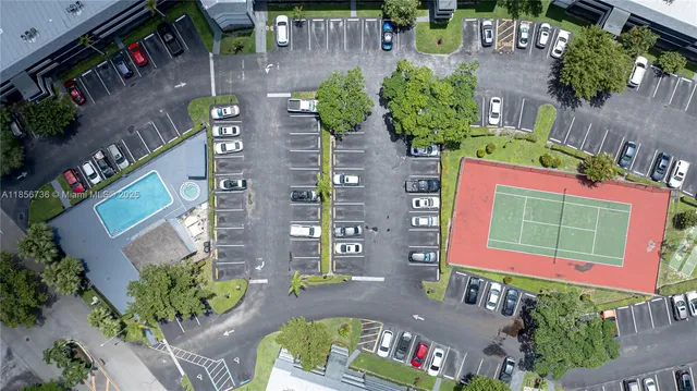 an aerial view of residential house with outdoor space and street view