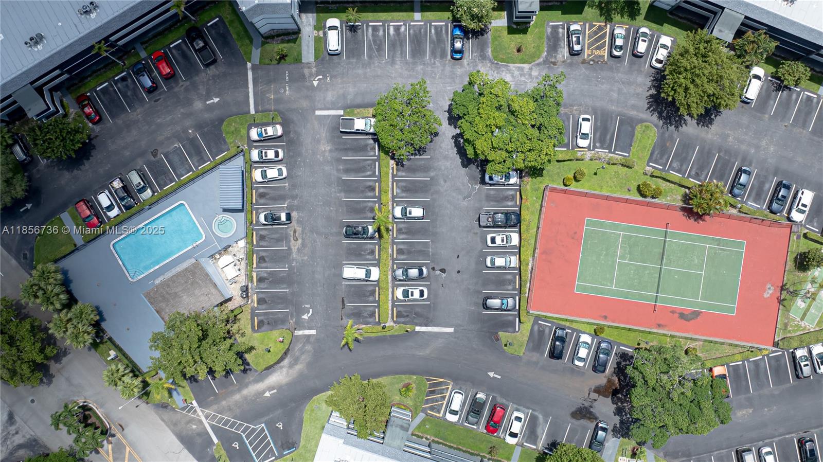 8321 Sands Point Boulevard, Unit D205 Tamarac, FL 33321 - Photo 16 of 18 an aerial view of residential house with outdoor space and street view