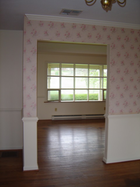 1672 Barterbrook Road Staunton, VA 24401 - Photo 17 of 44 a view of an empty room with wooden floor and a window