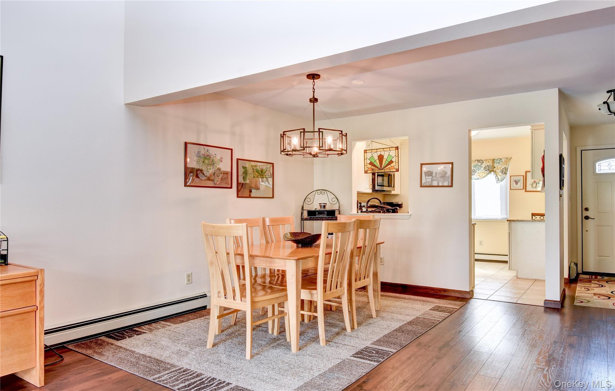 39 Butler Drive Goshen, NY 10924 - Photo 17 of 29 a view of a dining room with furniture and wooden floor