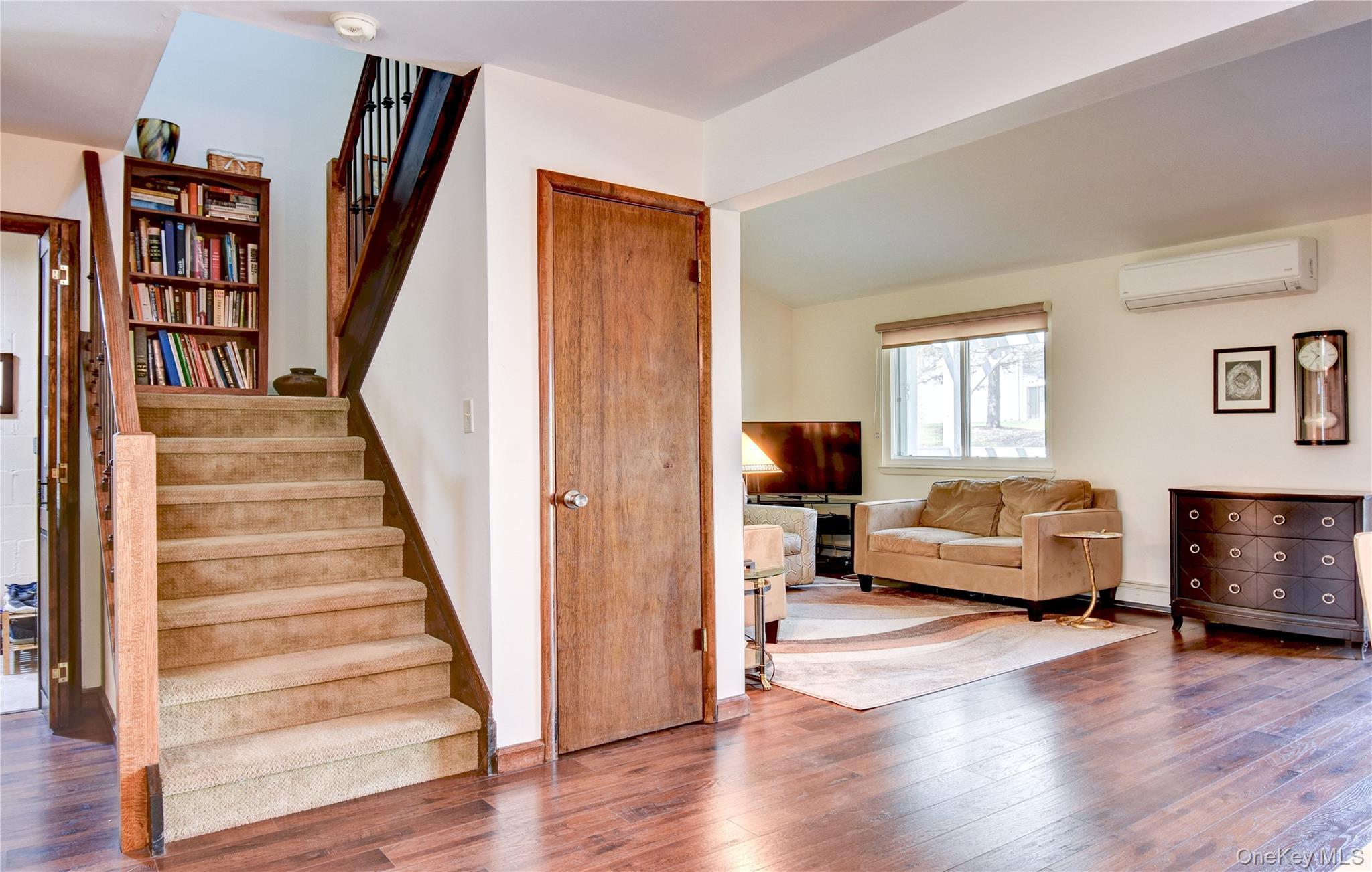 39 Butler Drive Goshen, NY 10924 - Photo 20 of 29 a living room with furniture and a wooden floor