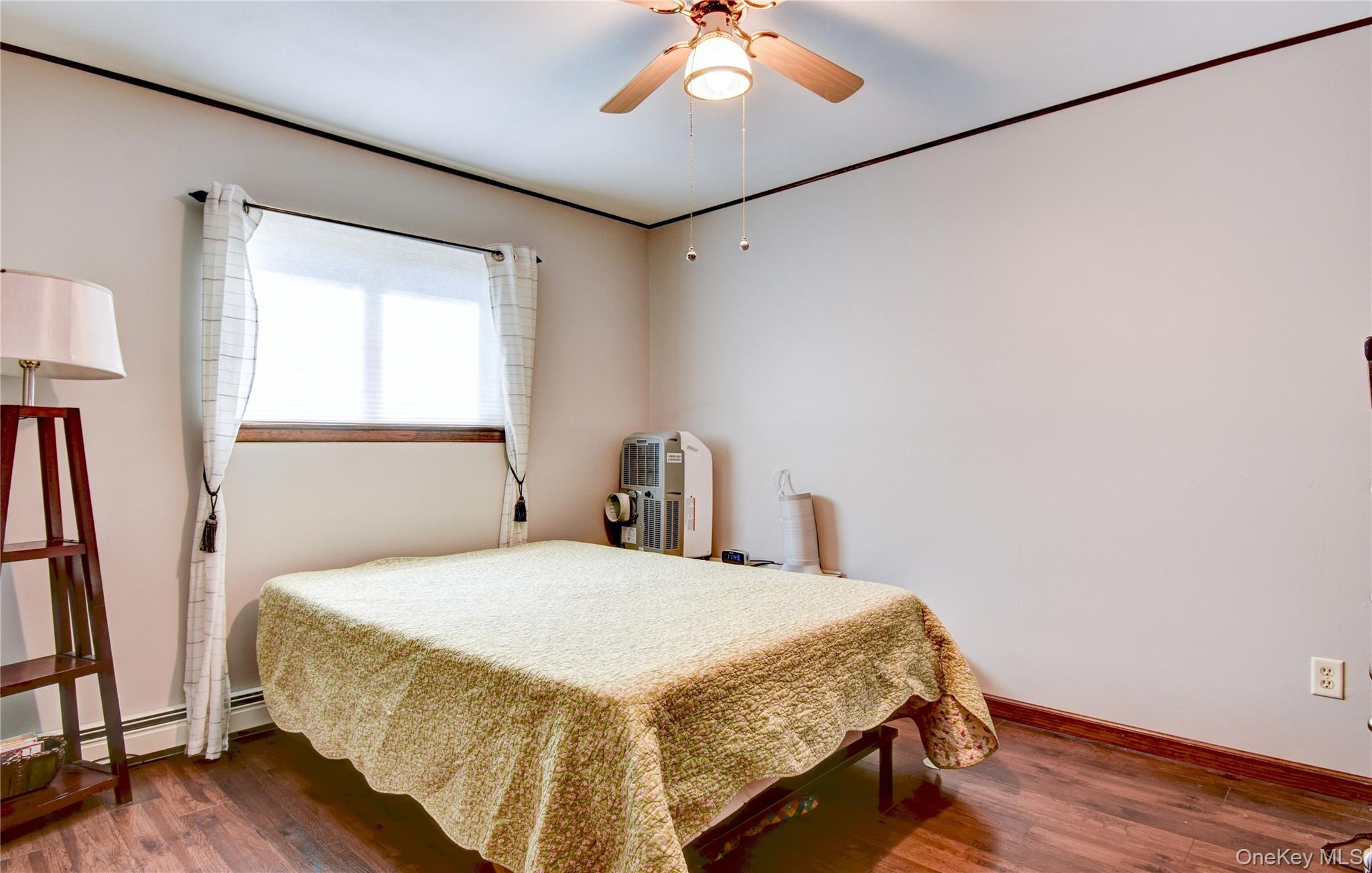 39 Butler Drive Goshen, NY 10924 - Photo 23 of 29 a bedroom with a bed and a window