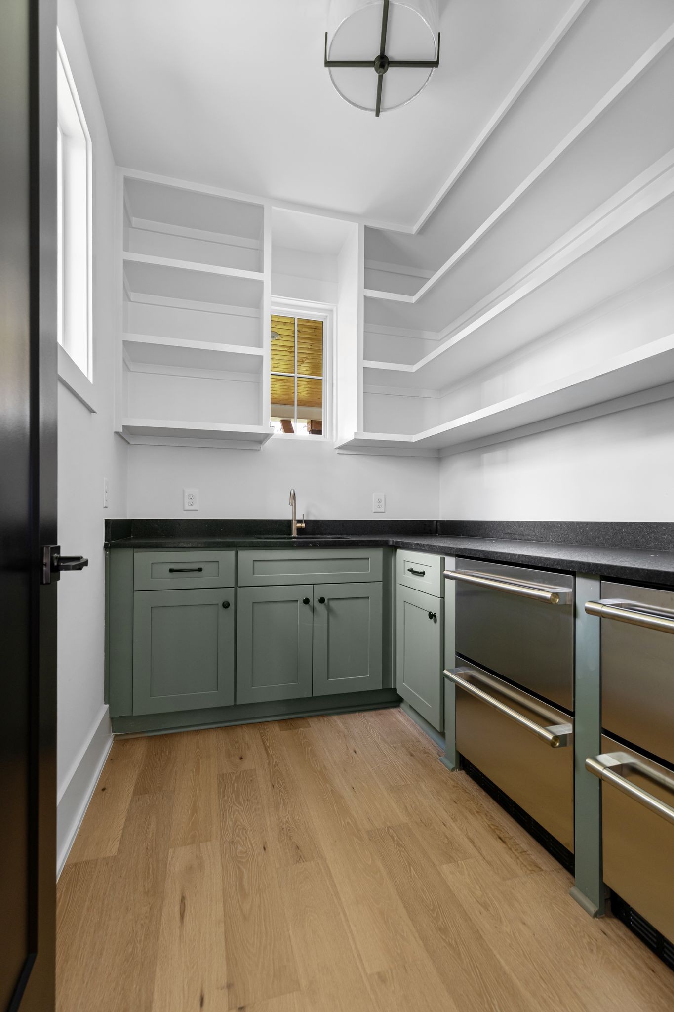 2823 Sugar Tree Road Nashville, TN 37215 - Photo 12 of 59 a kitchen with a cabinets and chandelier