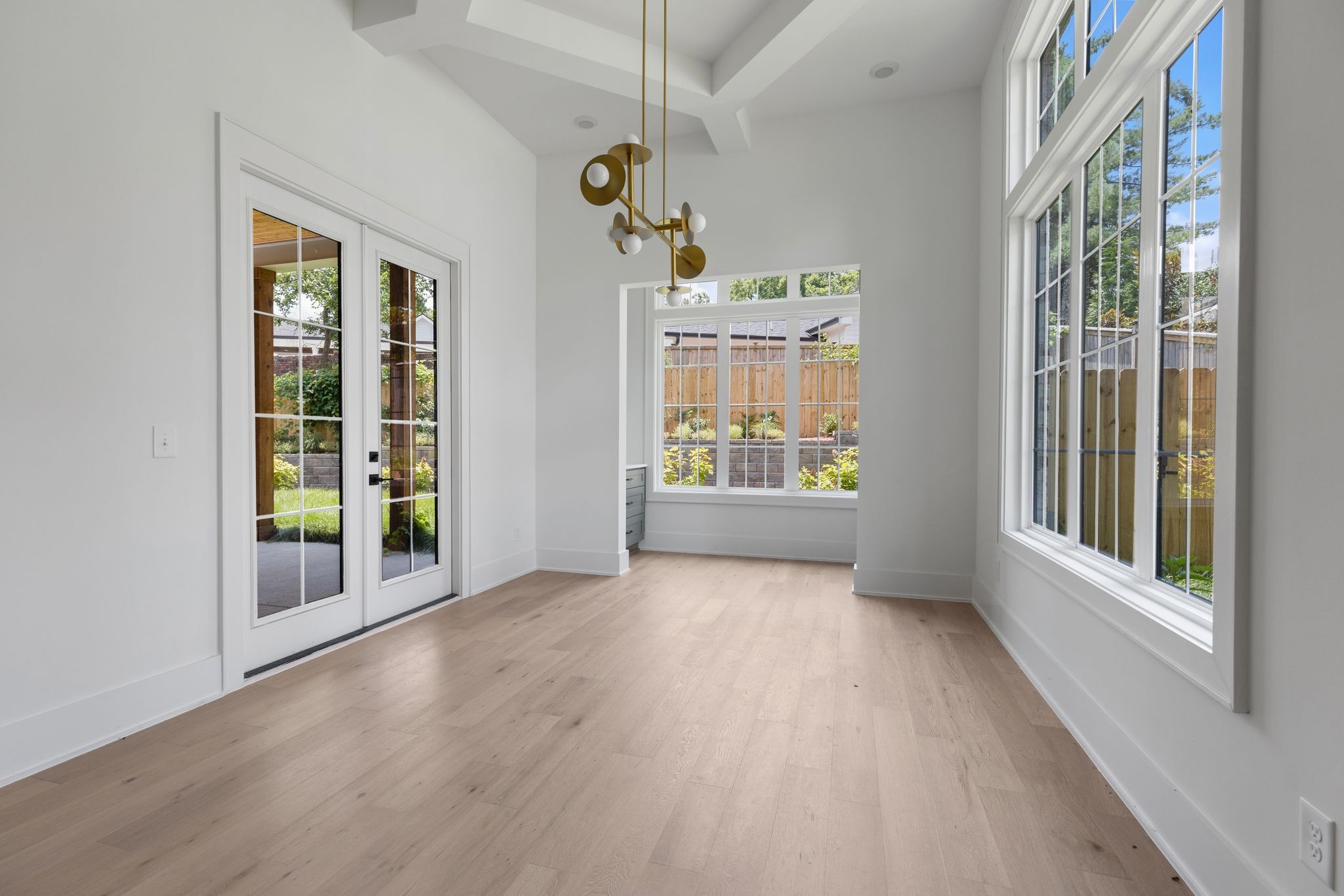 2823 Sugar Tree Road Nashville, TN 37215 - Photo 13 of 59 wooden floor in an empty room with a window