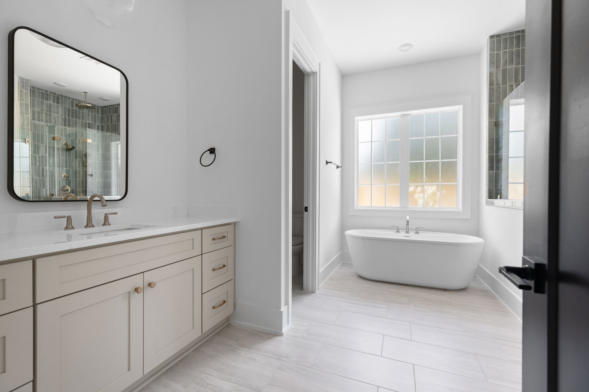 2823 Sugar Tree Road Nashville, TN 37215 - Photo 18 of 59 a bathroom with a tub sink and mirror