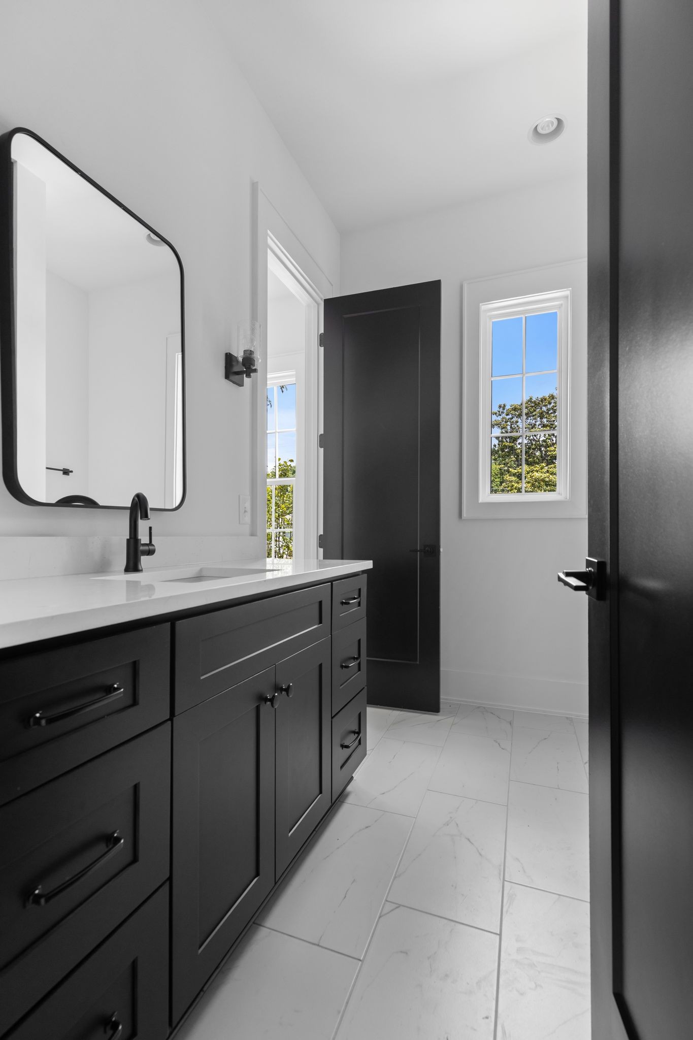 2823 Sugar Tree Road Nashville, TN 37215 - Photo 26 of 59 a spacious bathroom with a double vanity sink and a mirror