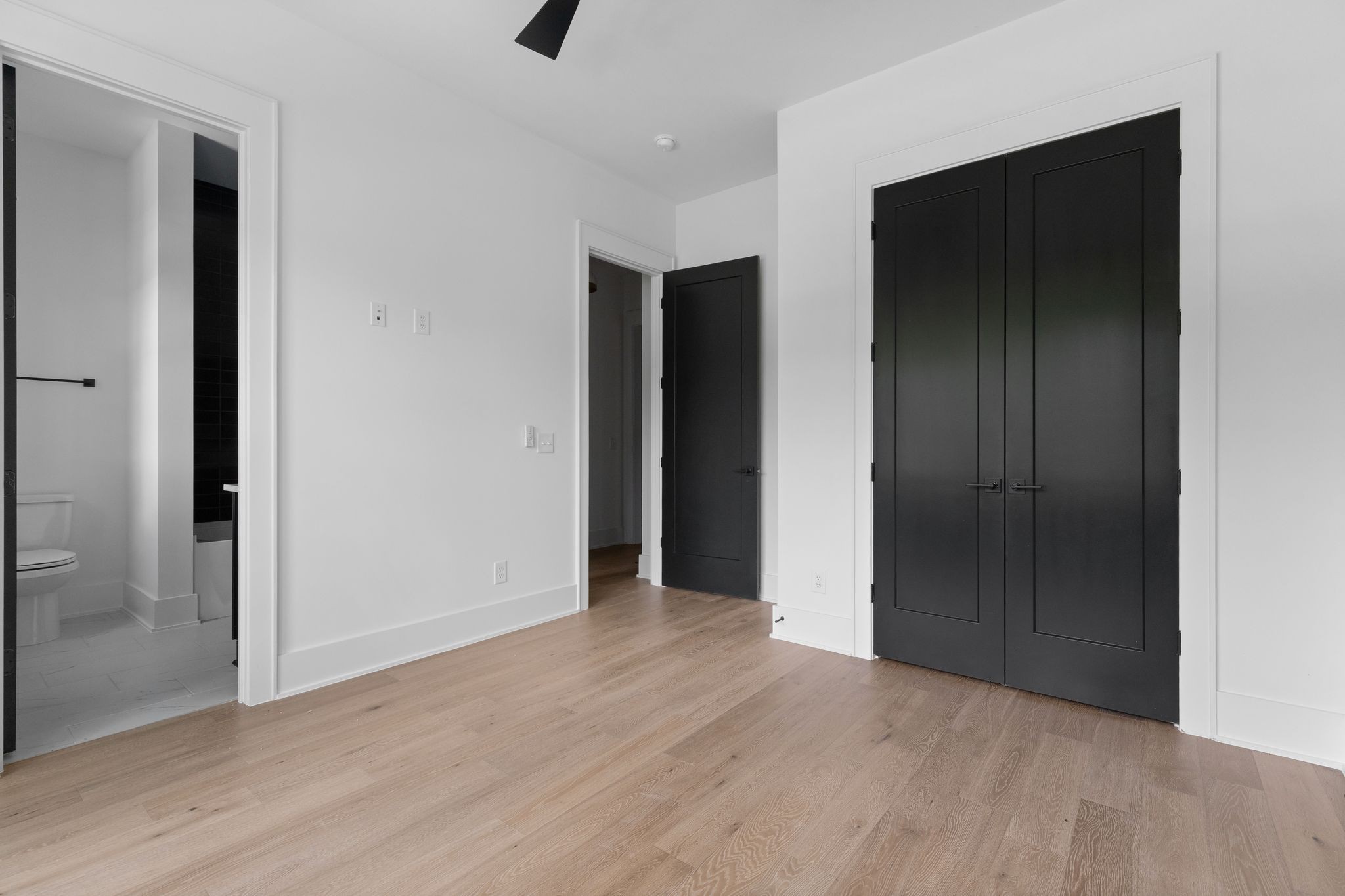 2823 Sugar Tree Road Nashville, TN 37215 - Photo 30 of 59 an empty room with wooden floor and closet