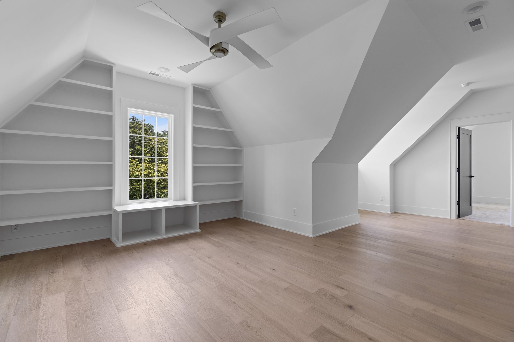 2823 Sugar Tree Road Nashville, TN 37215 - Photo 32 of 59 a view of an empty room with a window and wooden floor