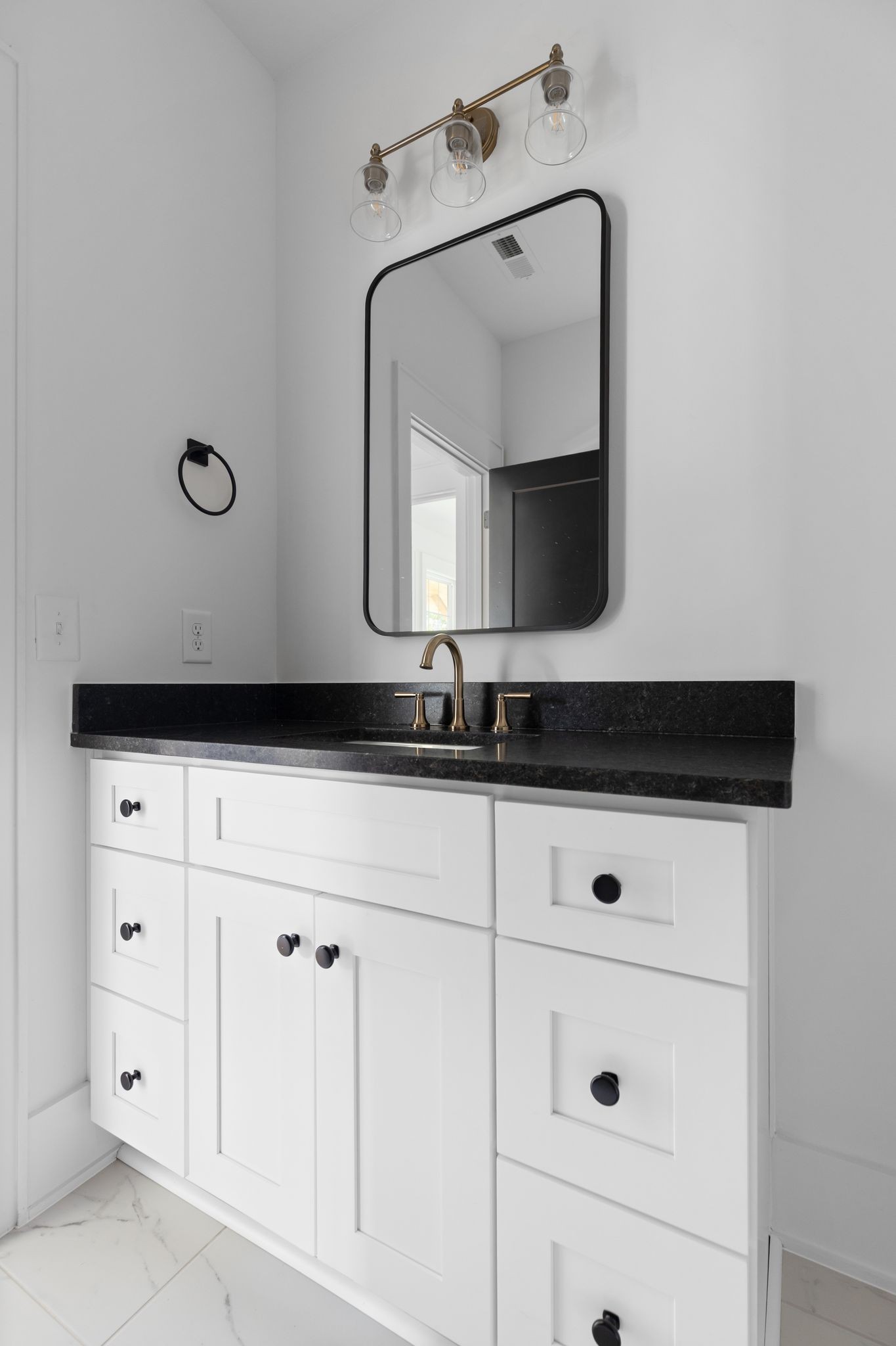 2823 Sugar Tree Road Nashville, TN 37215 - Photo 36 of 59 a bathroom with a sink and a mirror