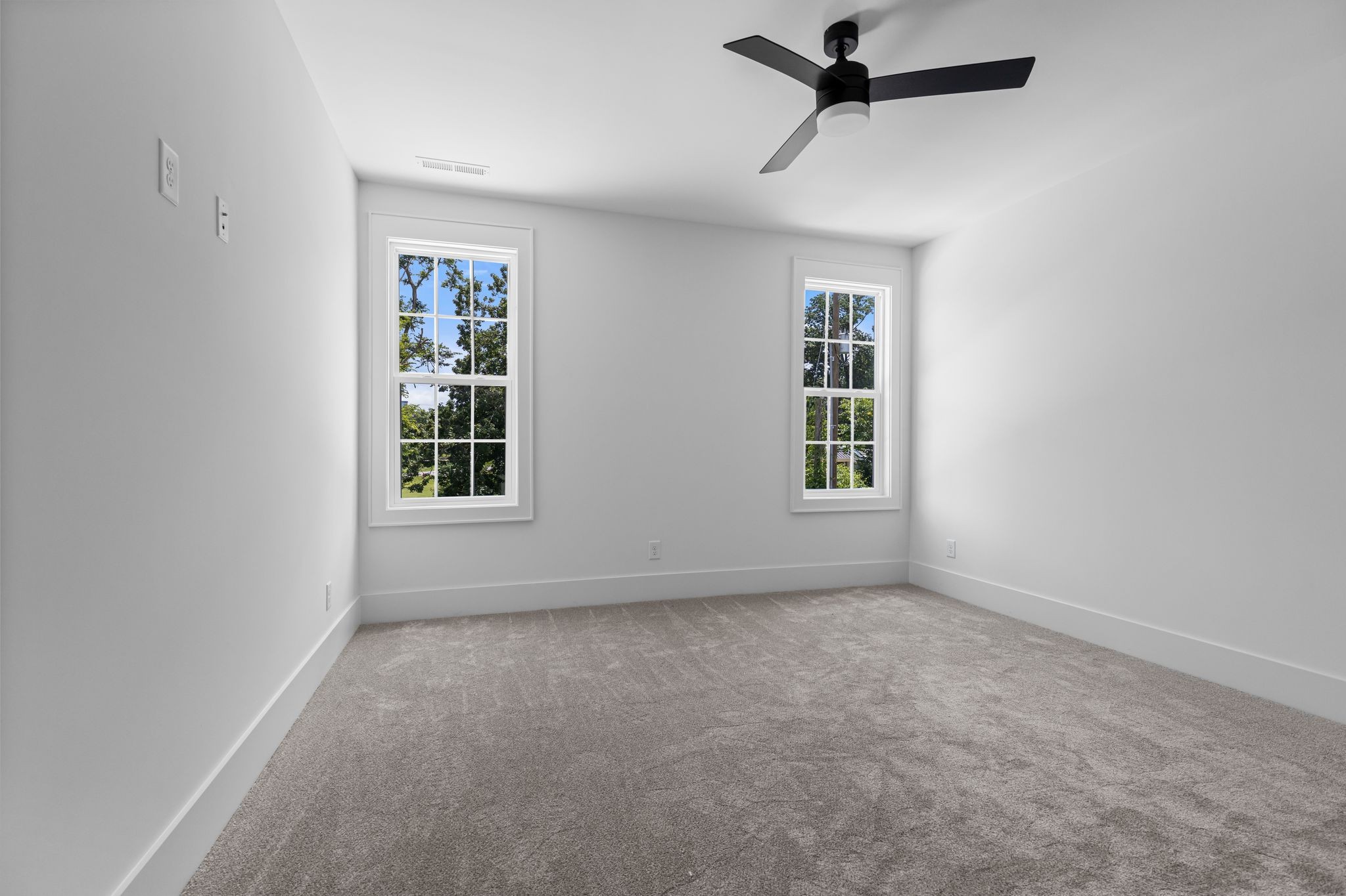 2823 Sugar Tree Road Nashville, TN 37215 - Photo 43 of 59 an empty room with windows and fan