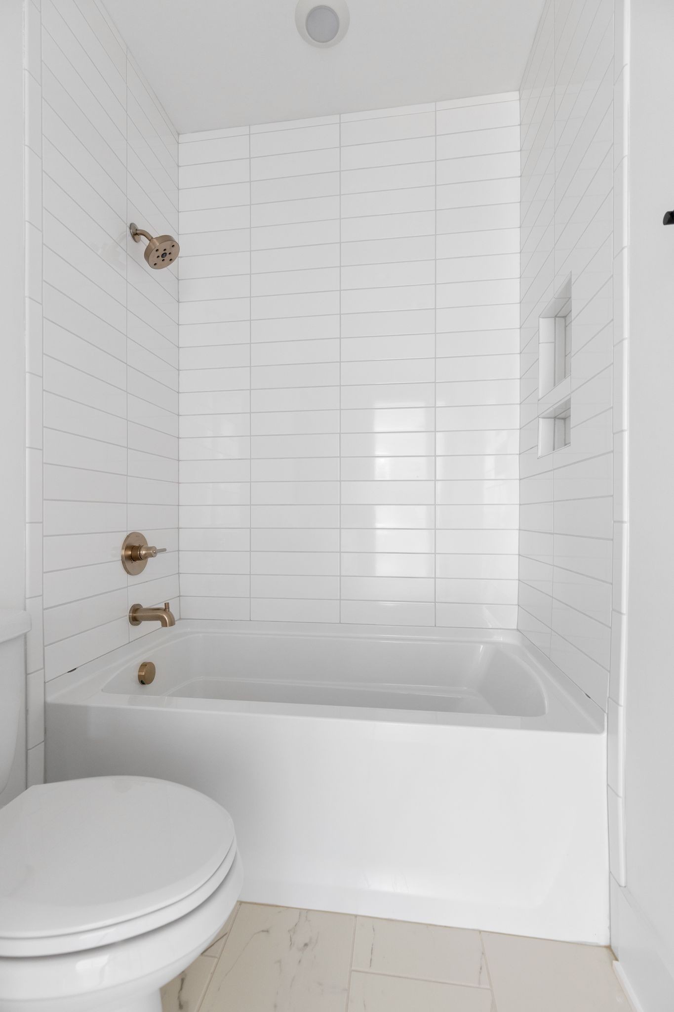 2823 Sugar Tree Road Nashville, TN 37215 - Photo 47 of 59 a bathroom with a toilet and a bathtub