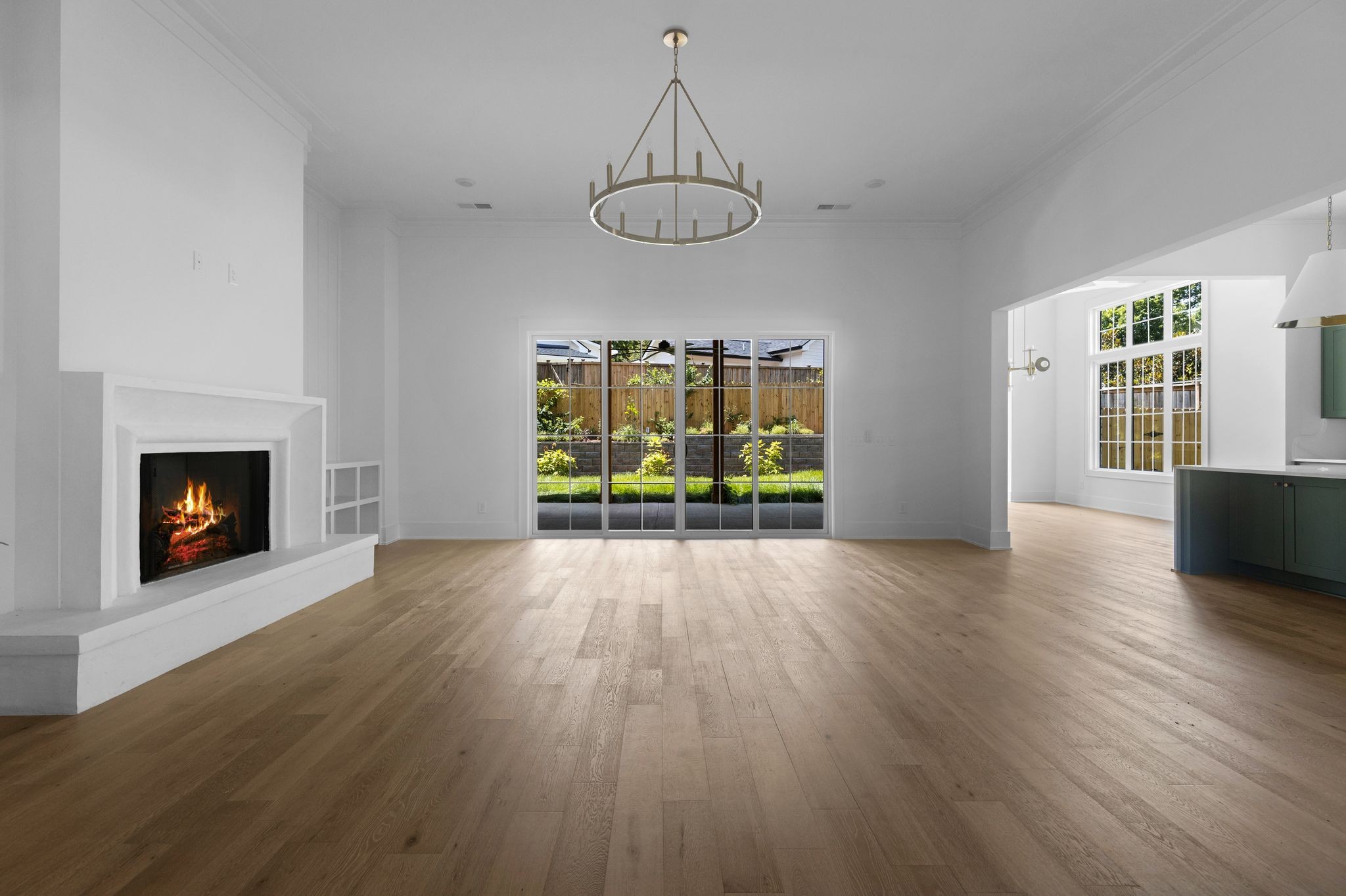 2823 Sugar Tree Road Nashville, TN 37215 - Photo 5 of 59 an empty room with wooden floor fireplace and windows