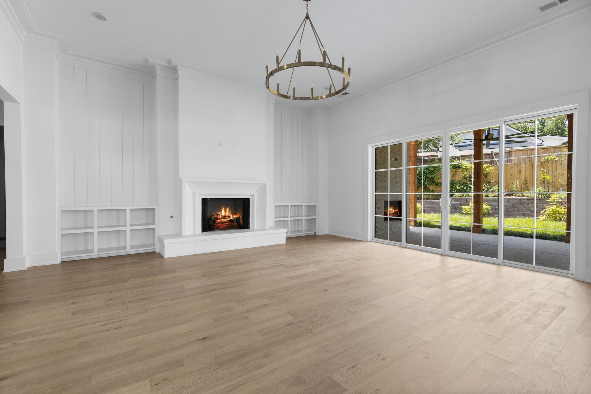 2823 Sugar Tree Road Nashville, TN 37215 - Photo 6 of 59 a view of an empty room with a window and fireplace