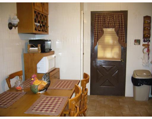 102 Van Kirk Road Monaca, PA 15061 - Photo 3 of 9 Kitchen. Large eat-in country kitchen, beautiful ceramic tile floor.