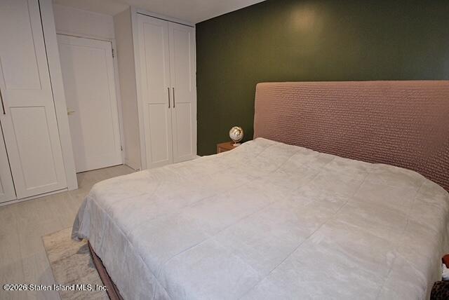 1000 Clove Road, Unit 2P Staten Island, NY 10301 - Photo 13 of 22 a bed room with a bed