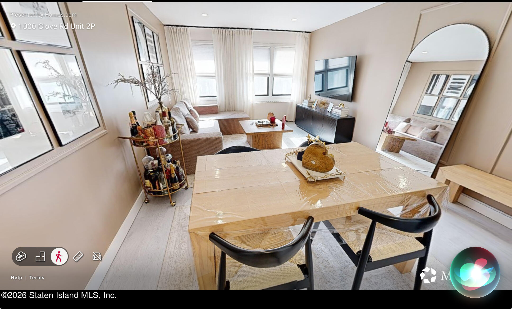 1000 Clove Road, Unit 2P Staten Island, NY 10301 - Photo 4 of 22 a view of a dining room with furniture and a potted plant